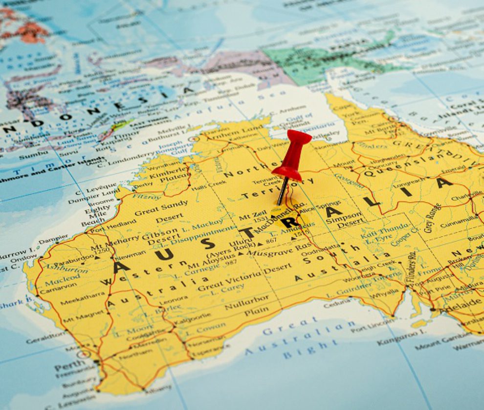 red pin placed selective at Australia map. - economic and government concept.